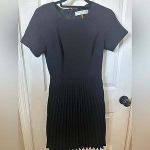 Black fit and flare Trina Turk dress
Size: 0